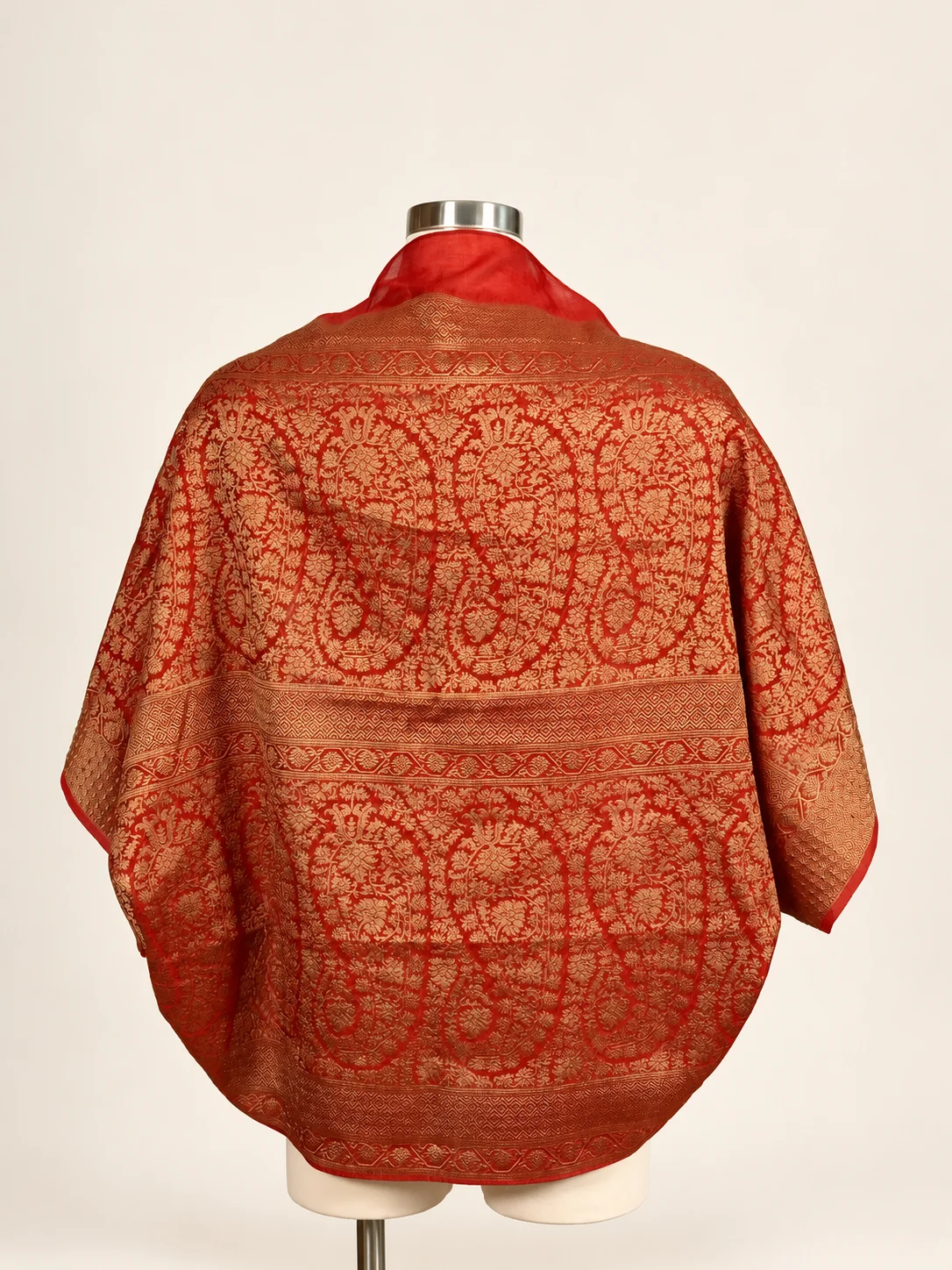 Back view of the Anjali Pallu Shrug showing its red and gold woven pallu pattern