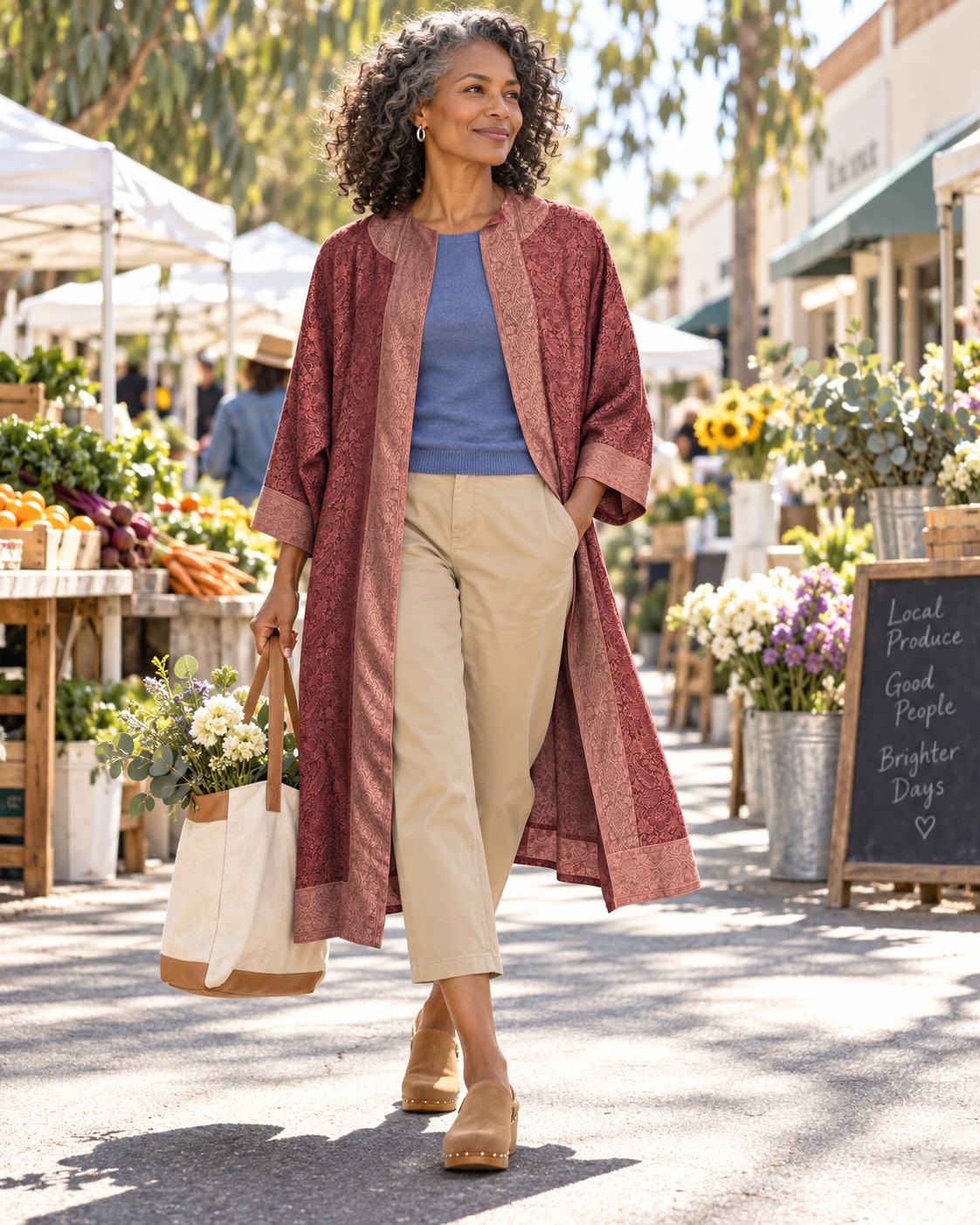 AI-generated styling: mauve Amara with a blue knit, cream trousers and tan clogs at a flower market.
